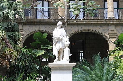 Statue of Christopher Columbus created in 1862 by Italian sculptor J. Cucchiari at the Palacio de los Capitanes Generales on the east side of Plaza de Armas, old Havana, Cuba.