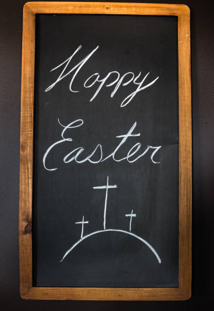 istock Happy Easter written on chalkboard with white chalk 673688060
