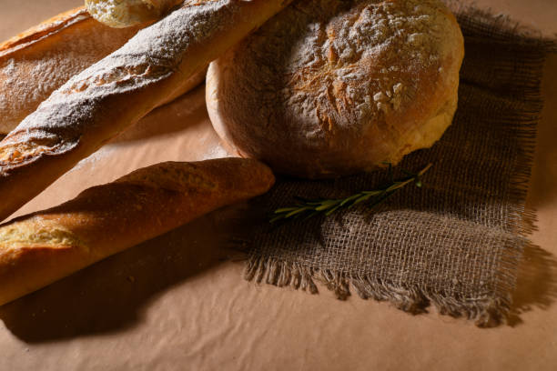 istock Freshly baked loaves, baguettes and bread 673690496