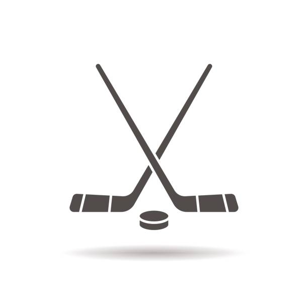 Hockey game equipment icon Hockey game equipment drop shadow icon. Isolated vector illustration. Hockey sticks and puck hockey stock illustrations