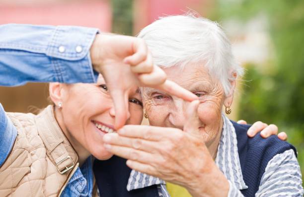 Elderly woman with grandchild