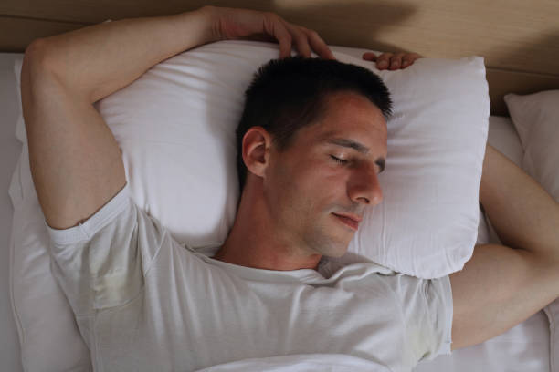 istock Young handsome man sleeping comfortably in bed. 673696968