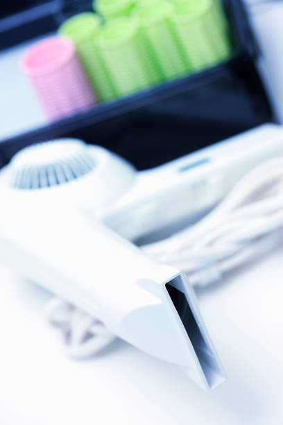 Hot curlers and hair dryer