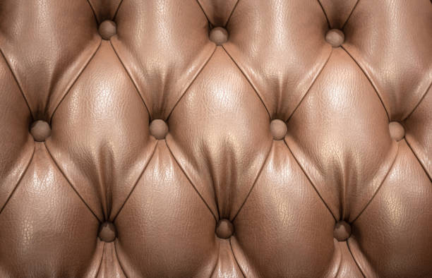 istock brown leather padded background with buttons attached. 673704358