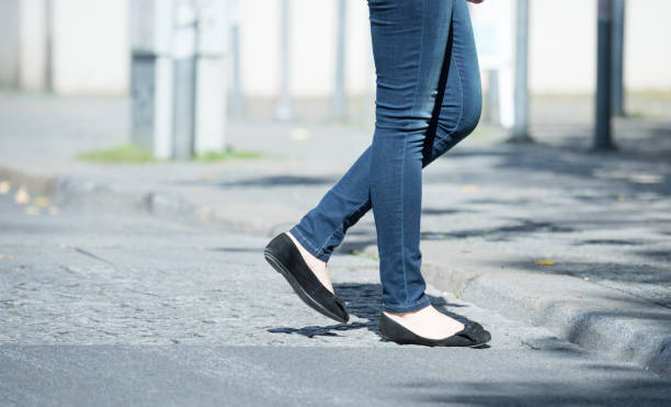 istock Woman crossing street 673713048