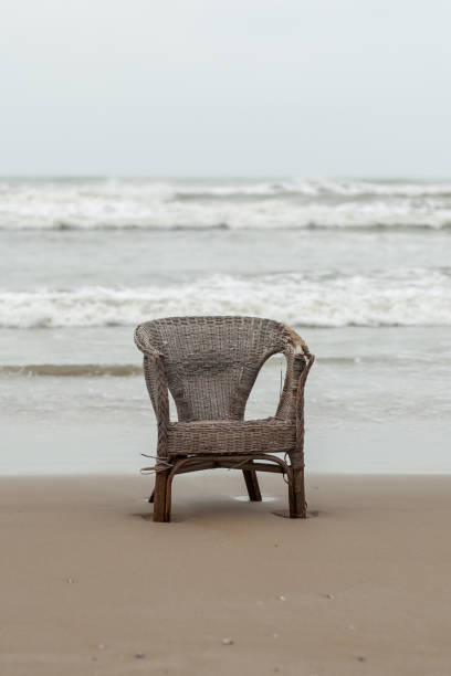istock chair on the beach 673716756