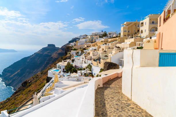 istock Path in Imerovigli village with typical Greek white architecture, Santorini island, Greece 673717090