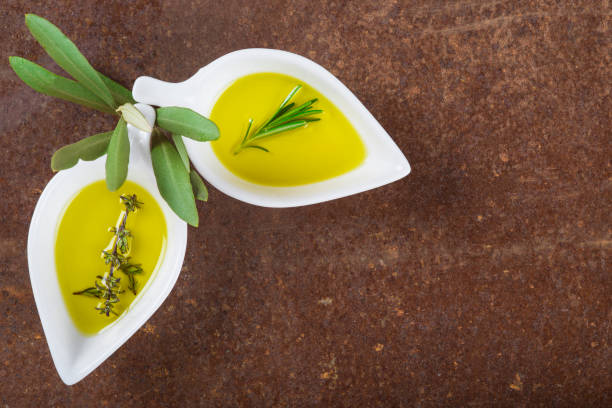 istock Extra virgin olive oil and green olives 673719958