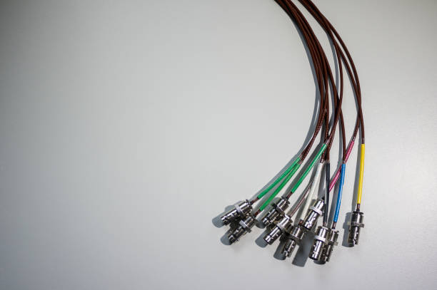 istock Bundle of BNC signal cables on white background - concept of broadcast TV and data communications 673720662