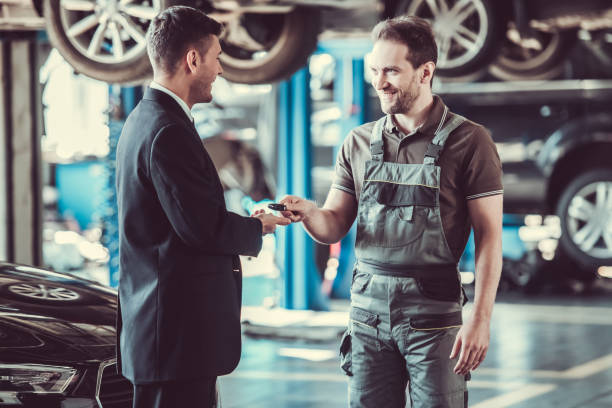 istock Handsome mechanic and businessman 673726066