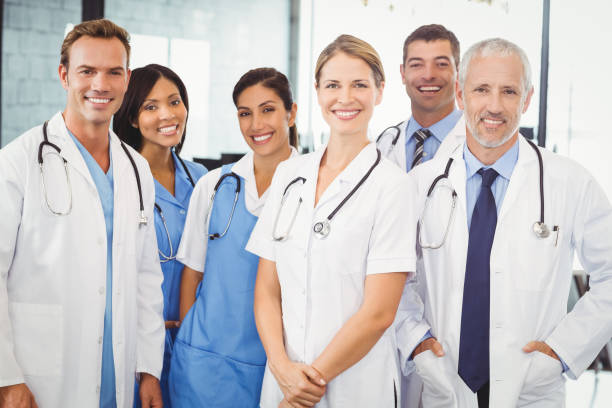istock Medical team smiling in hospital 673729078