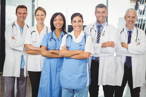 istock Medical team standing with arms crossed 673729146