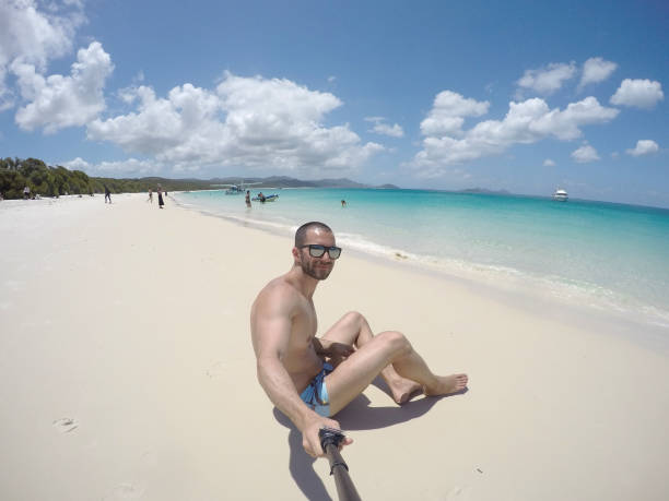 istock Man taking a selfie in Whitsunday, Australia 673730090
