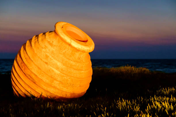 istock Ancient Greek amphora in the sunset 673732580