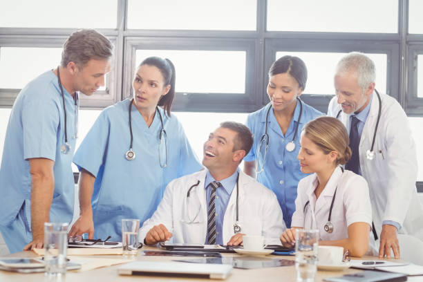 istock Medical team interacting in conference room 673732672