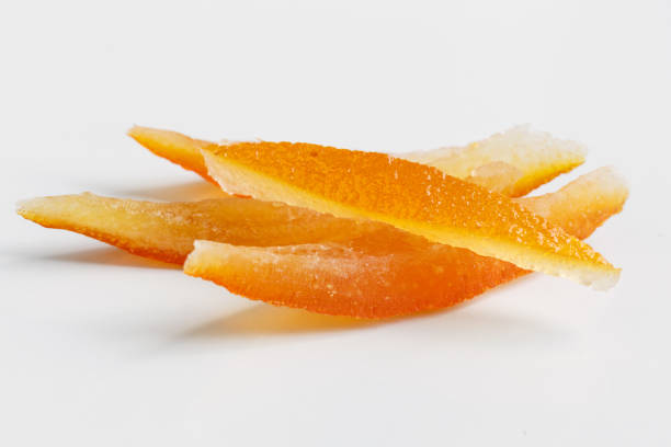 Candied orange peel Candied orange peel isolated on white candied fruit stock pictures, royalty-free photos & images