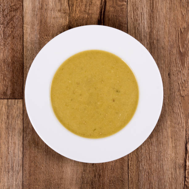 istock Vegetable soup on a wooden table 673734876