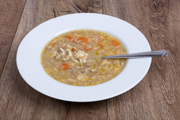 istock Vegetable soup on a wooden table 673734880