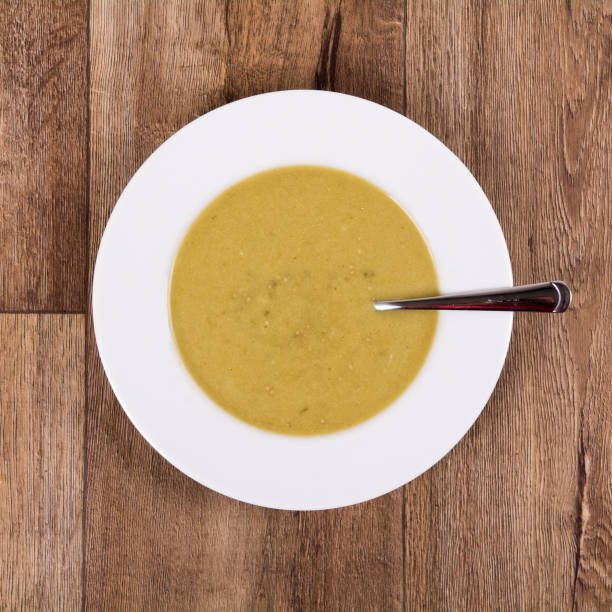 istock Vegetable soup on a wooden table 673734886