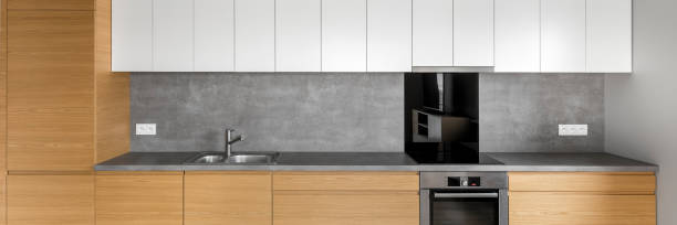 istock Kitchen with wooden cabinets 673738138