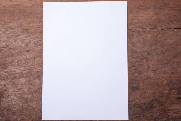 istock Office desk table with white paper, top view with copy space 673745222