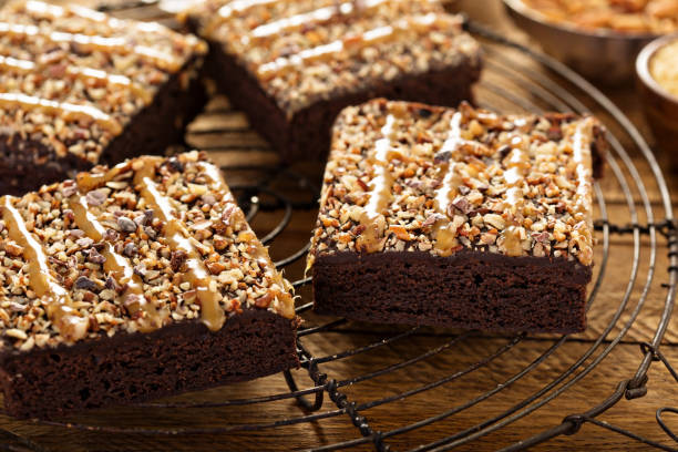 istock Fudgy brownies with nuts and caramel 673745426