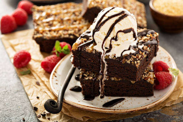 istock Fudgy brownies with nuts and caramel 673747642