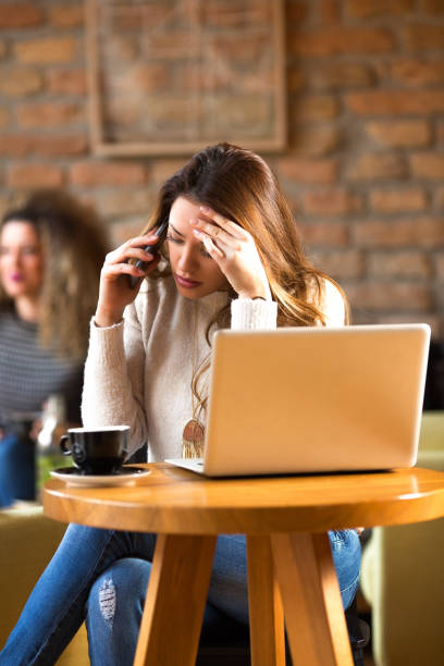 istock Young woman in a cafe 673768448