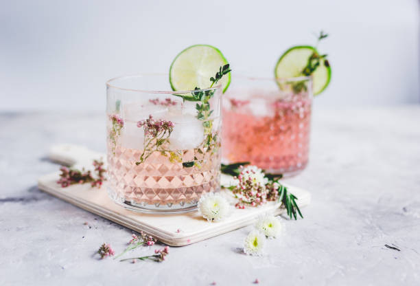 istock fresh homemade drink with flowers and lime on kitchen background 673768690