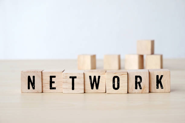 istock Network word on wooden cubes background, business and technology concept 673771646