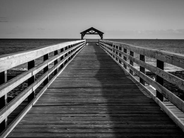 istock Waimea Town pier at sunset 673777332