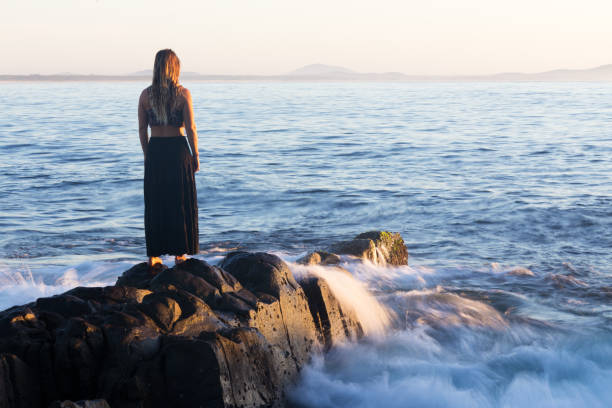 istock Girl and Empty Sea 673777808
