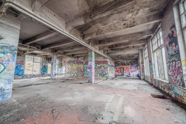Big empty room in old abandoned factory building