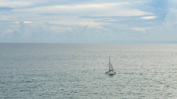 istock Lonly Yacht Sailing in the Sea 673781678