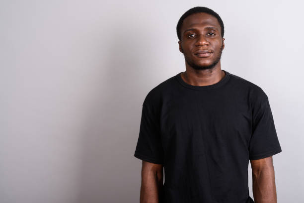istock Studio shot of young African man against gray background 673787648