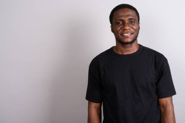 istock Studio shot of young African man against gray background 673787680