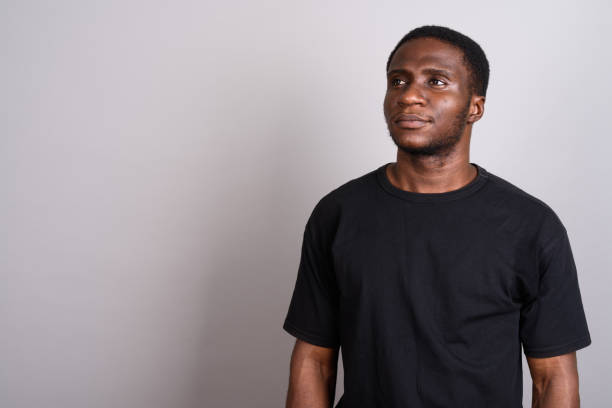 istock Studio shot of young African man against gray background 673787748