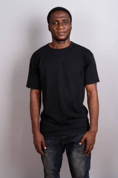 istock Studio shot of young African man against gray background 673787754