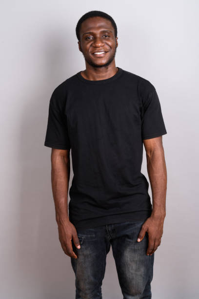istock Studio shot of young African man against gray background 673787824