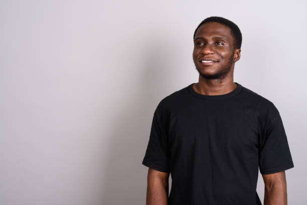 istock Studio shot of young African man against gray background 673787836