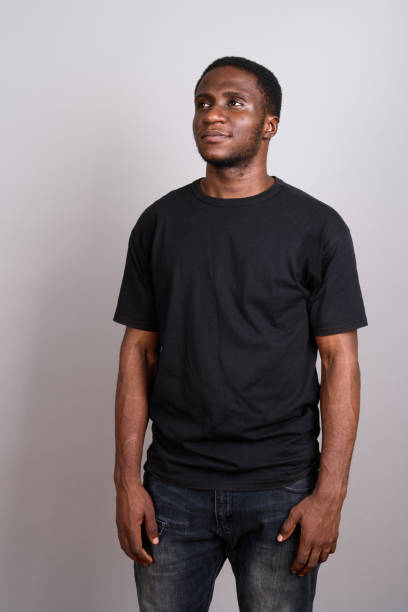 istock Studio shot of young African man against gray background 673787850