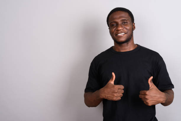 istock Studio shot of young African man against gray background 673787878