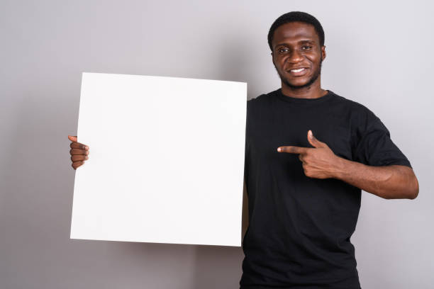 istock Studio shot of young African man against gray background 673788342