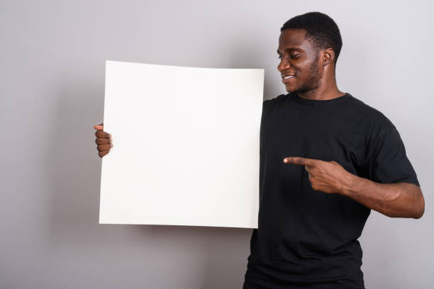 istock Studio shot of young African man against gray background 673788350