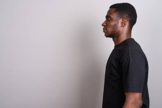 istock Studio shot of young African man against gray background 673788498