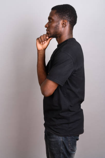 istock Studio shot of young African man against gray background 673788516