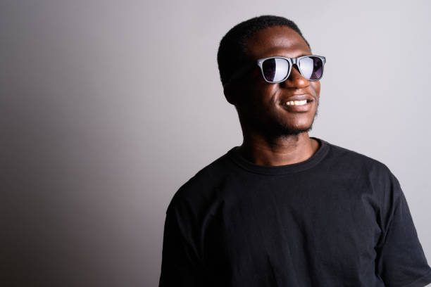 istock Studio shot of young African man against gray background 673788556