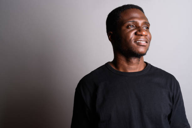 istock Studio shot of young African man against gray background 673788600