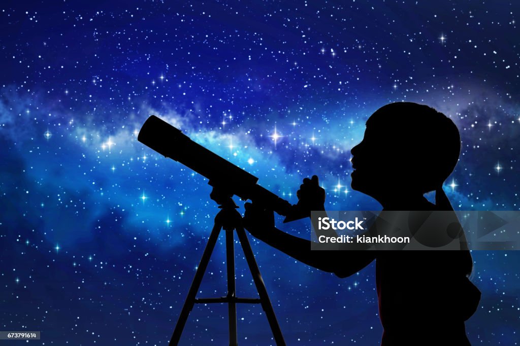 Silhouette of little girl looking through a telescope Silhouette of little girl looking through a telescope at the stars background Child Stock Photo