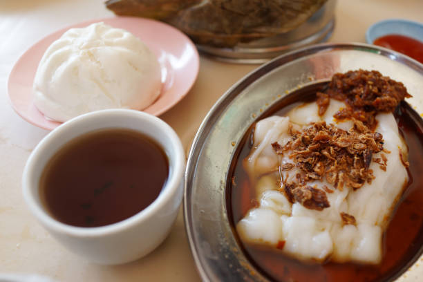 istock Steamed Cheong Fun or Rice Noodle Roll and various dim sum 673794322